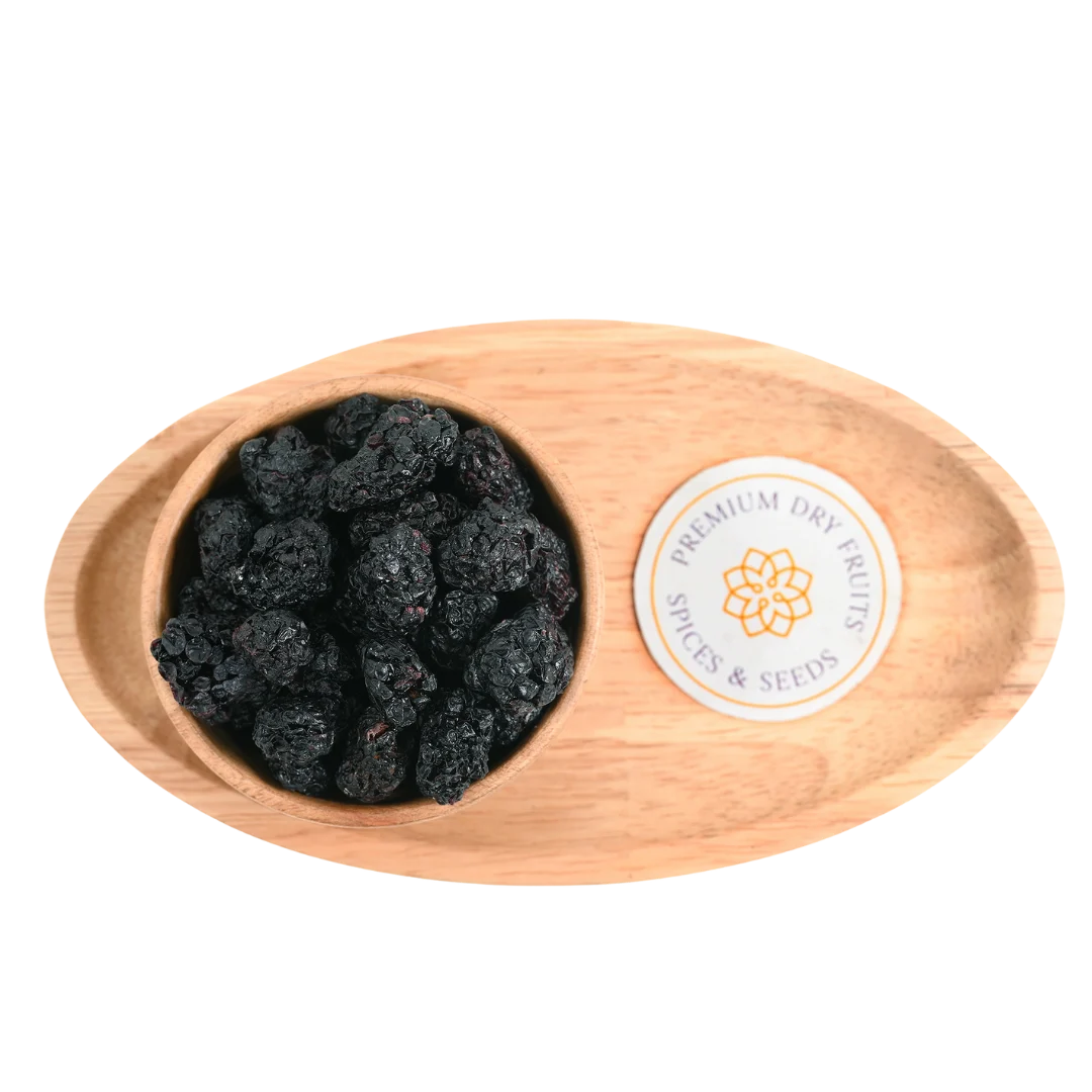Close-up of whole blackberries dried with a rich, deep hue and naturally glossy surface.