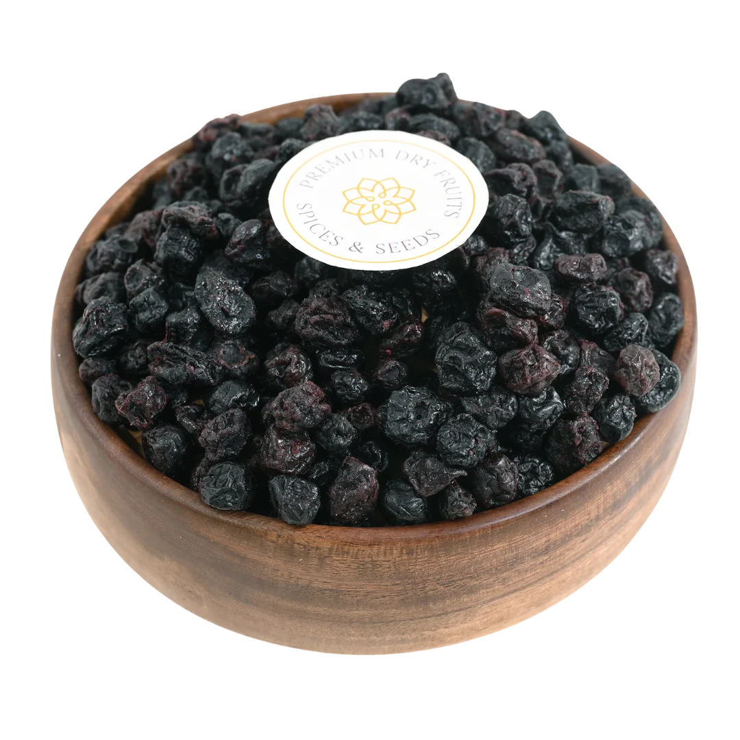 Blueberries Dried Whole Premium in a wooden bowl, showcasing their deep blue color and glossy finish.