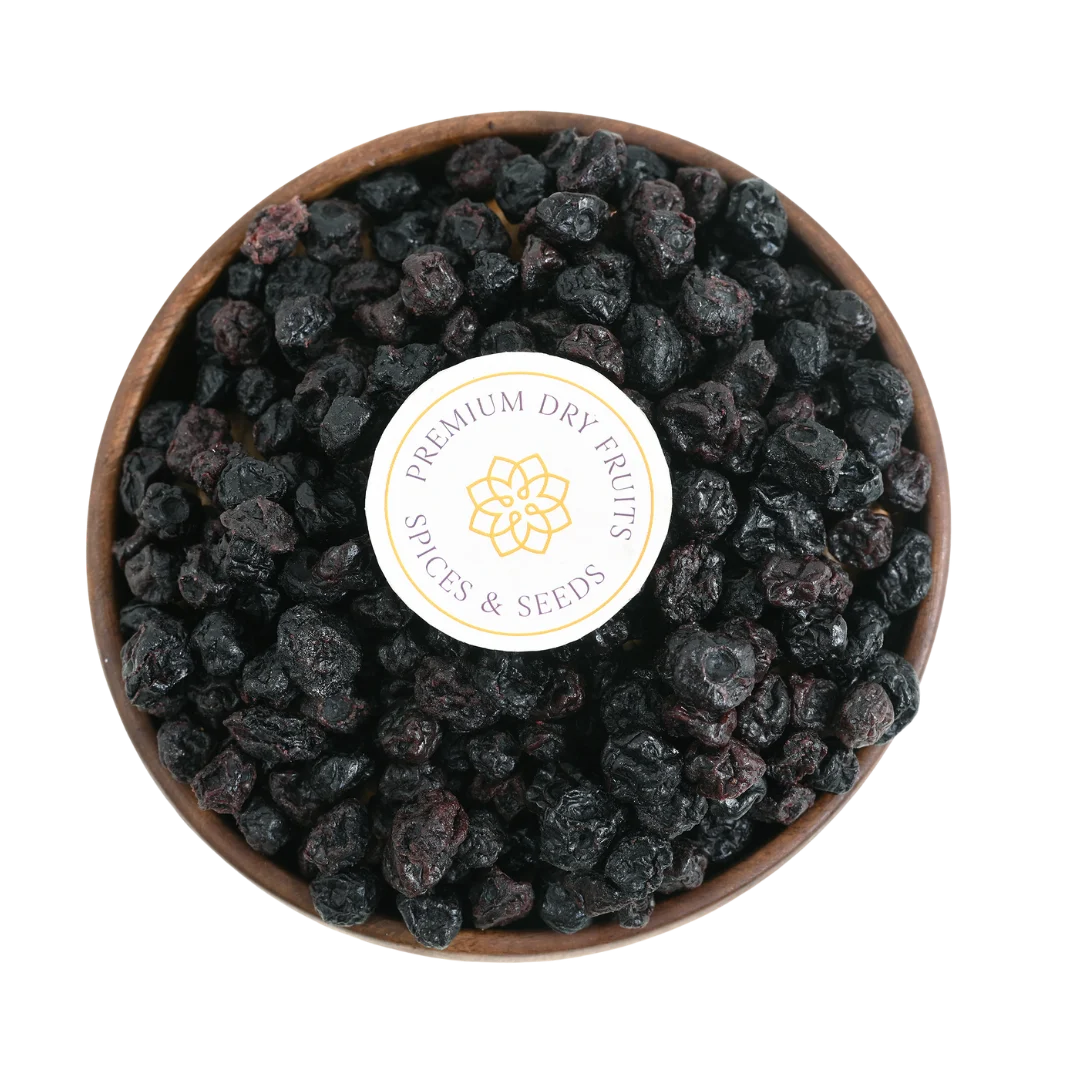 Close-up of Blueberries Dried Whole Premium with a rich, dark hue and plump texture, displayed in a rustic bowl.