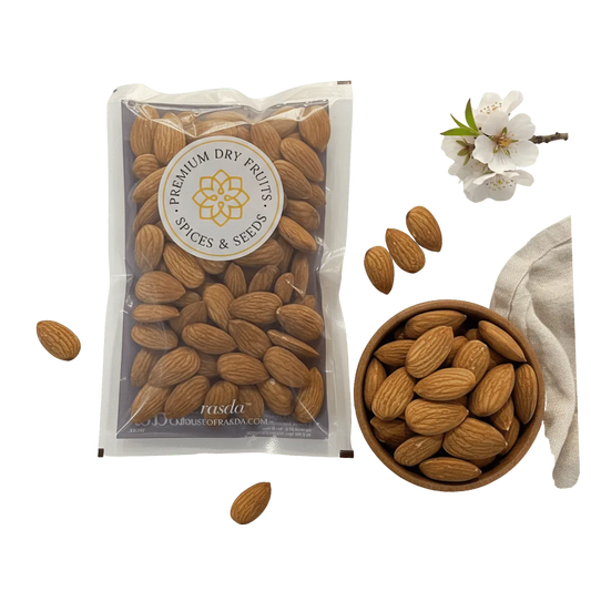 Packaged California Almonds Jumbo with a bowl of almonds and a flower on a white background