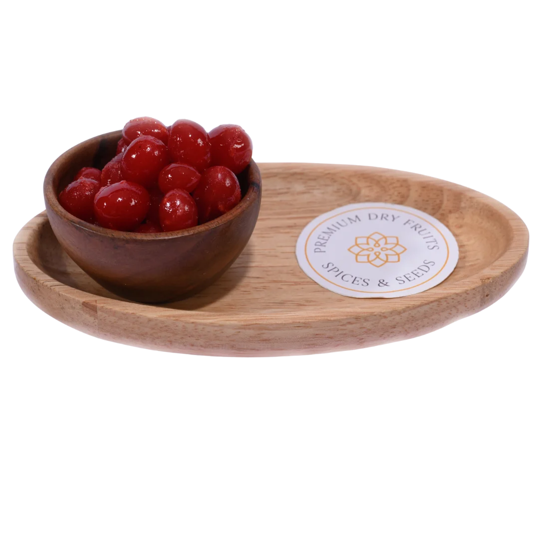 Bright red Candied Cherries/ Glace Cherries in a wooden bowl, showcasing their glossy, syrup-coated texture.