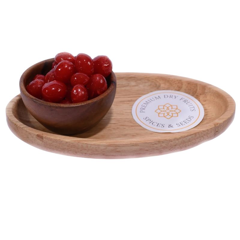 Bright red Candied Cherries/ Glace Cherries in a wooden bowl, showcasing their glossy, syrup-coated texture.