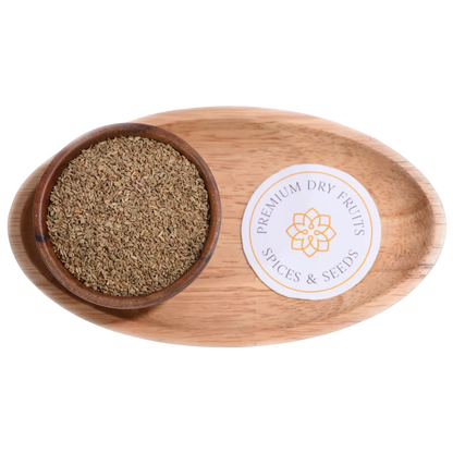 Ajwain or carom seeds natural Indian spice in wooden bowl for cooking and health