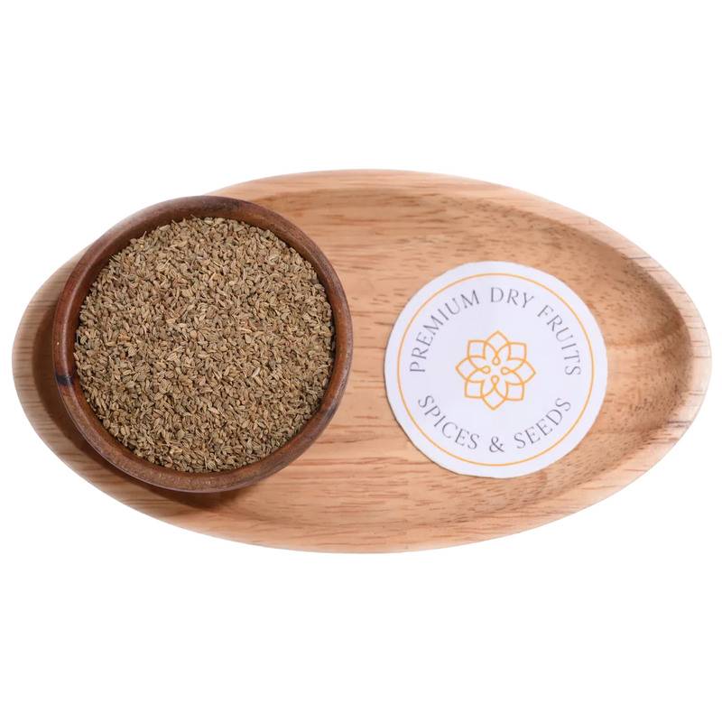 Ajwain or carom seeds natural Indian spice in wooden bowl for cooking and health