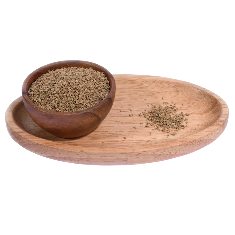 Organic Ajwain or carom seeds in wooden bowl aromatic Indian spice for kitchen use