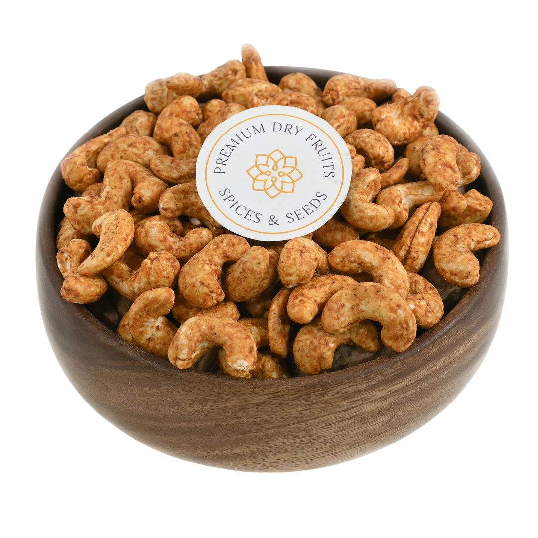 Smoky barbeque spiced cashew nuts served in a wooden bowl, buy flavoured cashews online in Bangalore