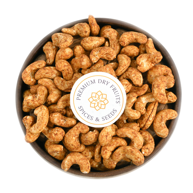 Cashew Nuts Barbeque features premium cashews seasoned with a blend of onion, garlic, tomato, black pepper, chili powder, and a hint of citrus.