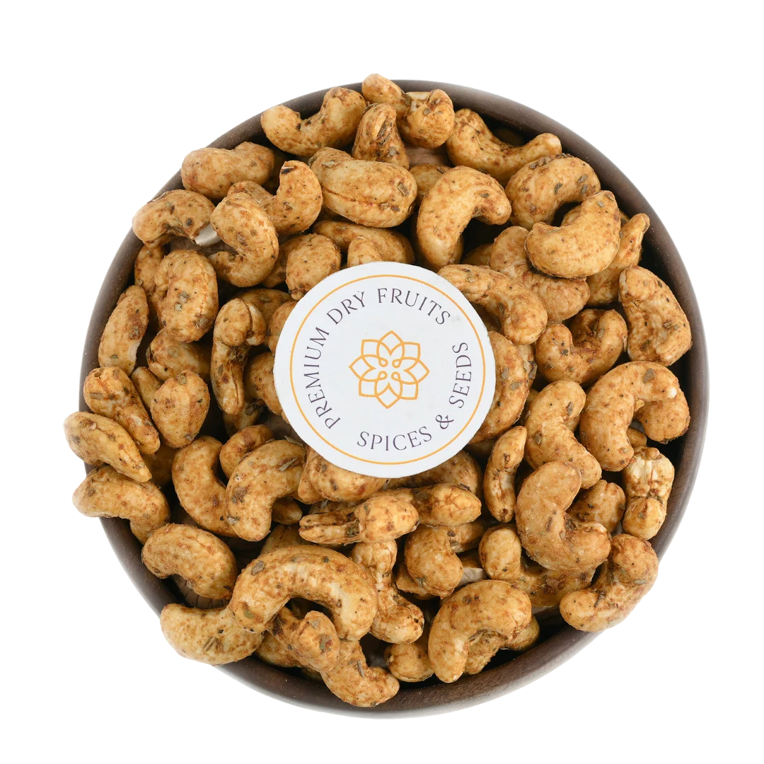 Roasted cashews tossed in tangy chilli garlic spice mix, perfect for snacking and gifting.