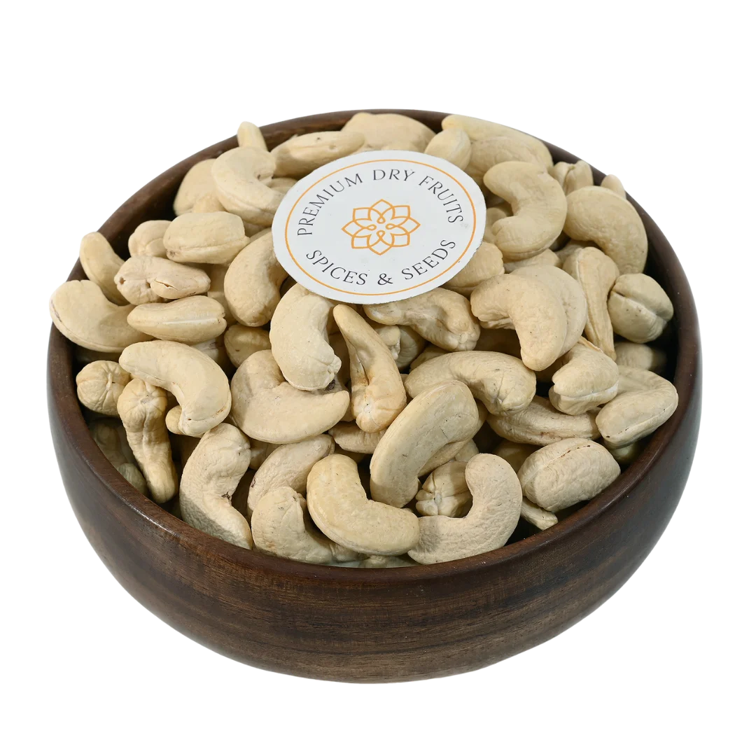 Premium dry fruits displayed in a wooden bowl, fresh cashews perfect for sweets, snacks, and recipes, available online across India from House of Rasda.