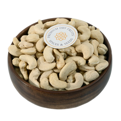Premium dry fruits displayed in a wooden bowl, fresh cashews perfect for sweets, snacks, and recipes, available online across India from House of Rasda.