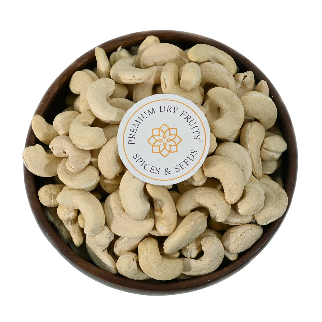 Best quality cashew nuts arranged in a wooden bowl, ideal for gifting and healthy snacking, freshly packed by House of Rasda.