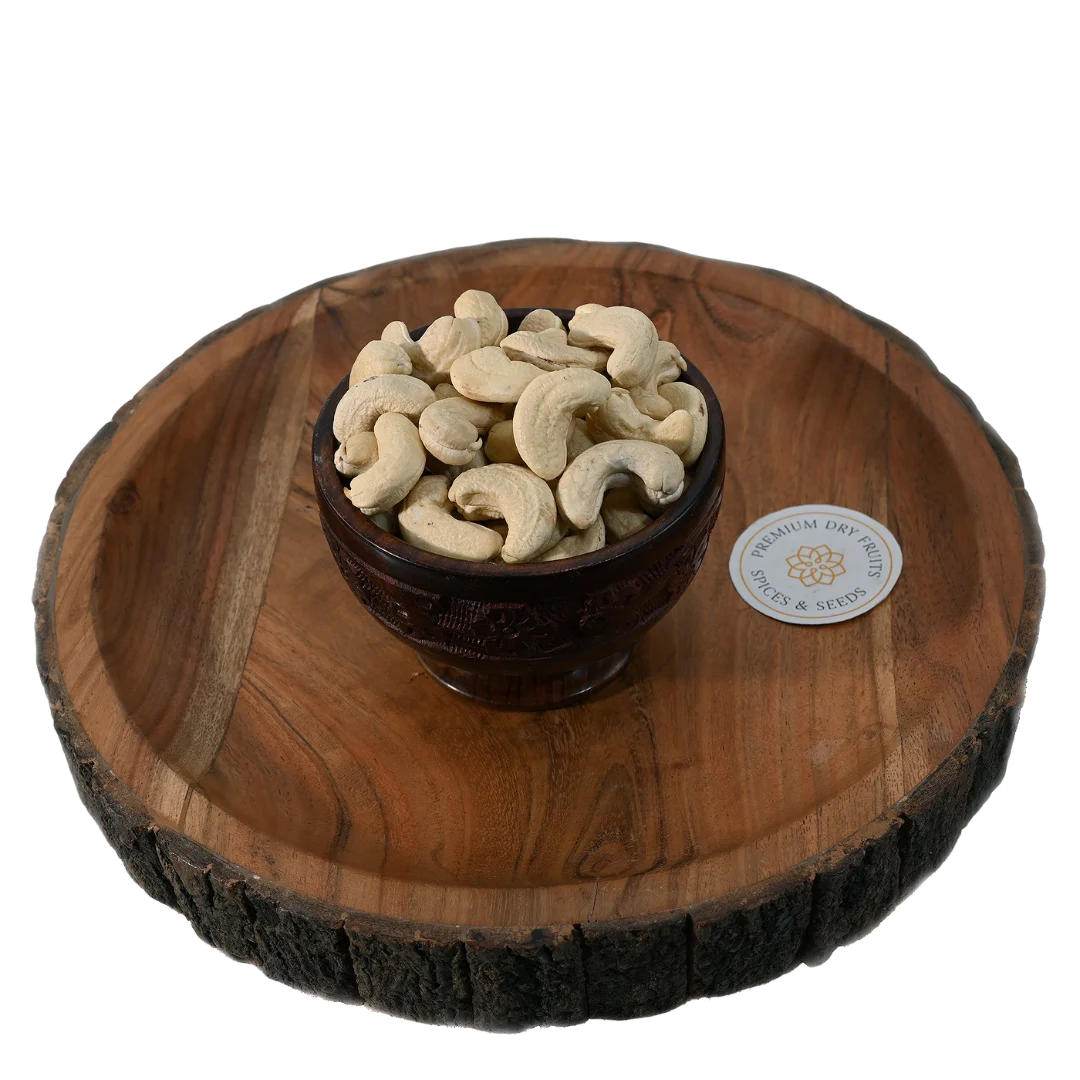 Hand-picked whole cashews with natural shine and smooth texture, premium quality dry fruits from House of Rasda, available to buy online in Bangalore.