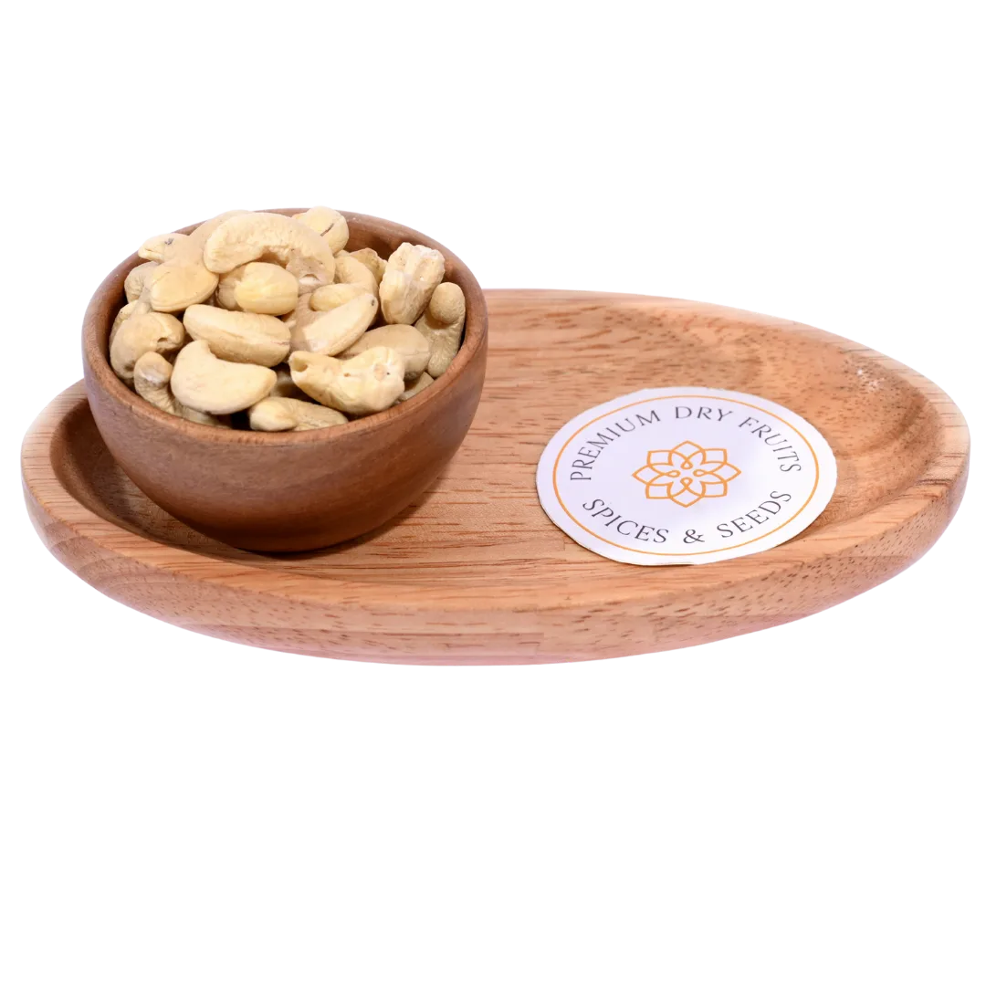 Cashew Nuts Kernels Standard in a wooden bowl display premium, whole cashew kernels.