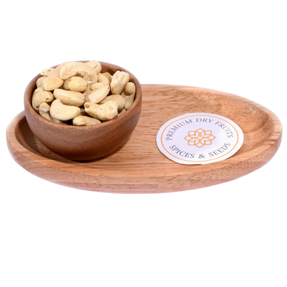 Cashew Nuts Kernels Standard in a wooden bowl display premium, whole cashew kernels.