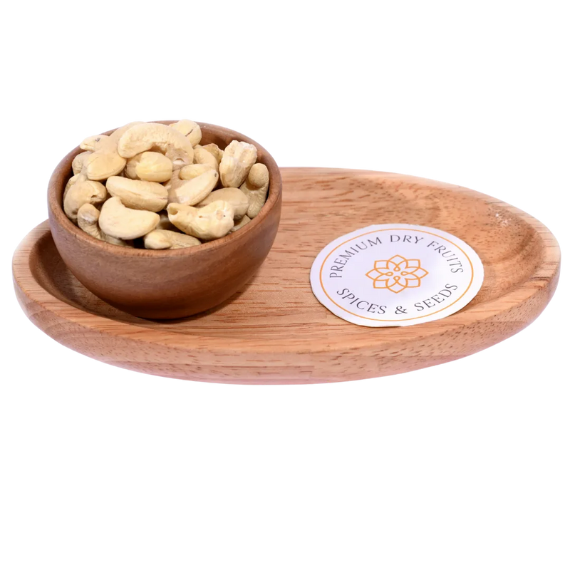 Cashew Nuts Kernels Standard in a wooden bowl display premium, whole cashew kernels.