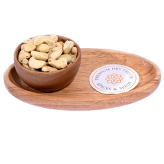 Cashew Nuts Kernels Standard in a wooden bowl display premium, whole cashew kernels.