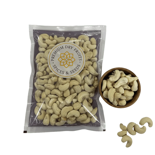 Packaged Cashew Nuts Kernels Standard – Regular Whole Cashews (W320) with a bowl and cashew on a white background