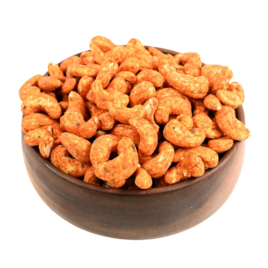 Premium paneer tikka flavoured cashews in a rustic wooden bowl, best spiced dry fruits online in Bangalore from House of Rasda, full of tangy and savoury taste.