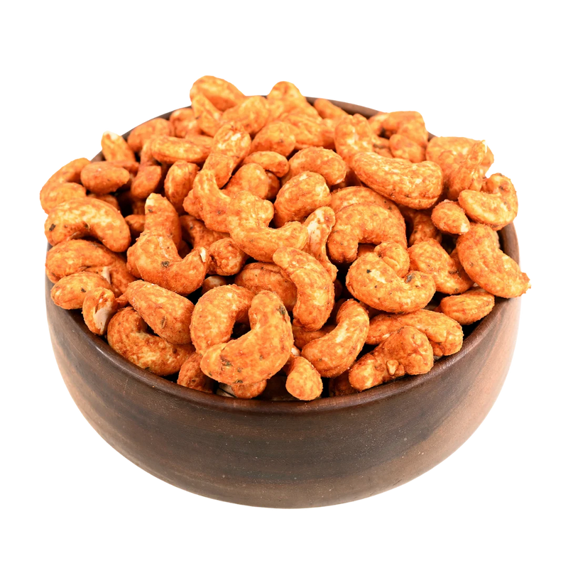 Premium paneer tikka flavoured cashews in a rustic wooden bowl, best spiced dry fruits online in Bangalore from House of Rasda, full of tangy and savoury taste.
