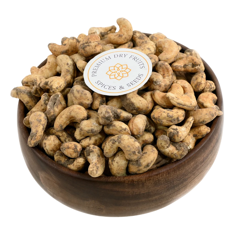 Crunchy cashew nuts coated with bold black pepper spice, served in a wooden bowl, buy pepper spiced cashews online in Bangalore from House of Rasda.