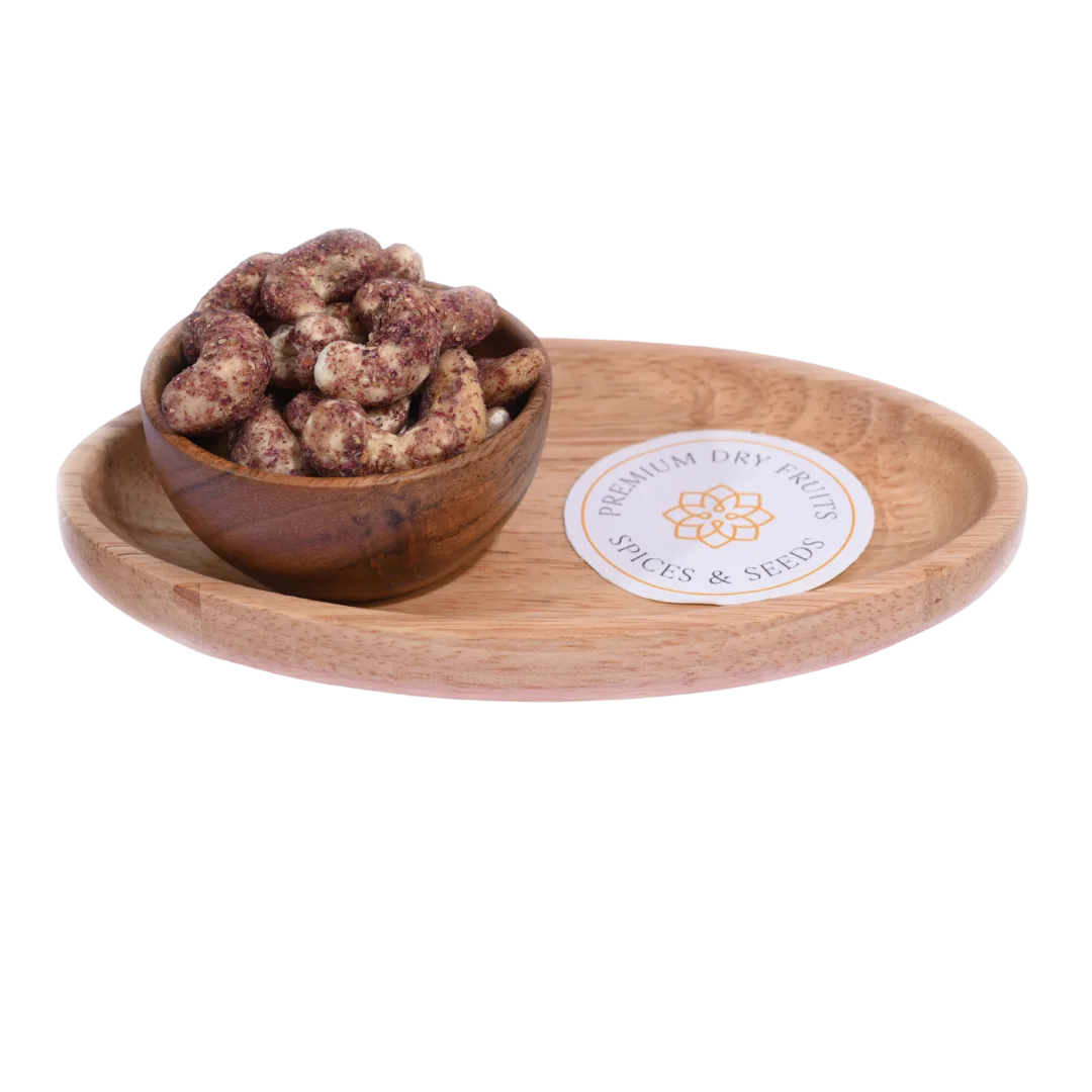 Wooden bowl with dried fruits(Cashew Nuts Rose Petal) on a wooden tray with a visible brand label.