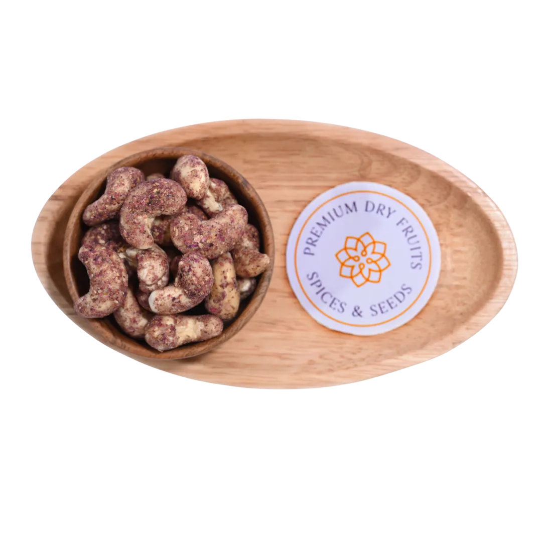 Wooden bowl with Cashew Nuts Rose Petal and a 'Premium Dry Fruits Spices & Seeds' label on a white background