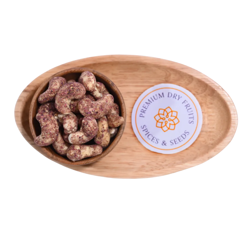 Wooden bowl with Cashew Nuts Rose Petal and a 'Premium Dry Fruits Spices & Seeds' label on a white background