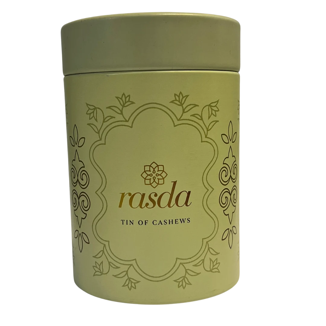Green canister with Cashew 'rasda' branding on a white background