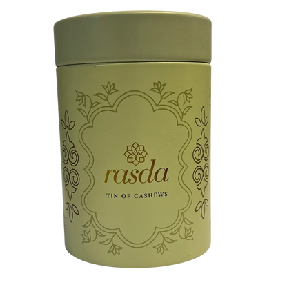Green canister with Cashew 'rasda' branding on a white background
