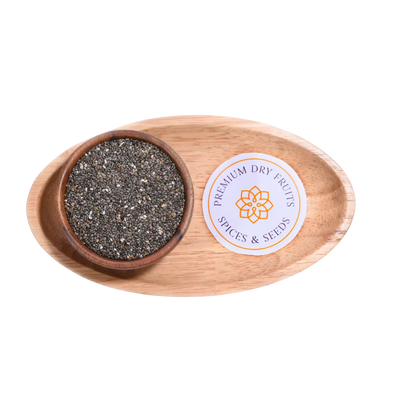 Wooden bowl with chia seeds and a 'Spices & Seeds' label on a white background