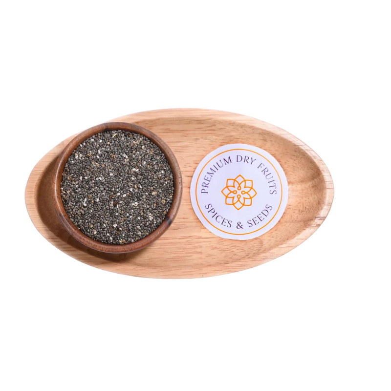 Wooden bowl with chia seeds and a 'Spices & Seeds' label on a white background
