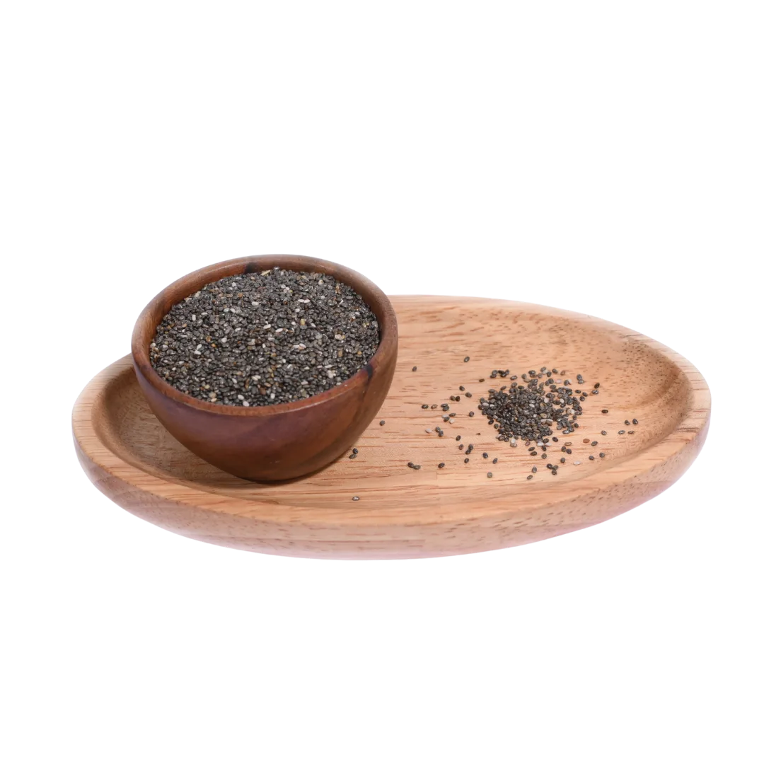 Wooden bowl with chia seeds on a wooden tray on a white background