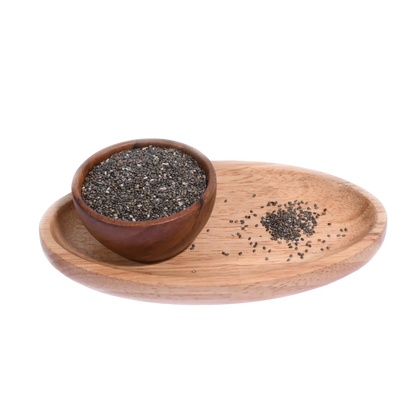 Wooden bowl with chia seeds on a wooden tray on a white background