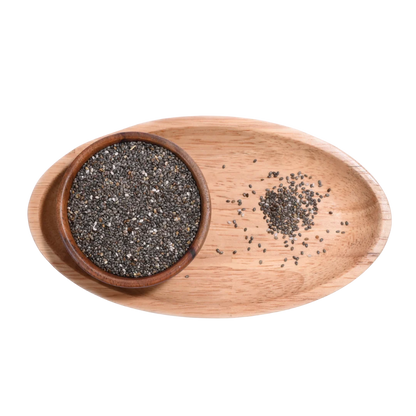 Wooden bowl with chia seeds on a wooden tray
