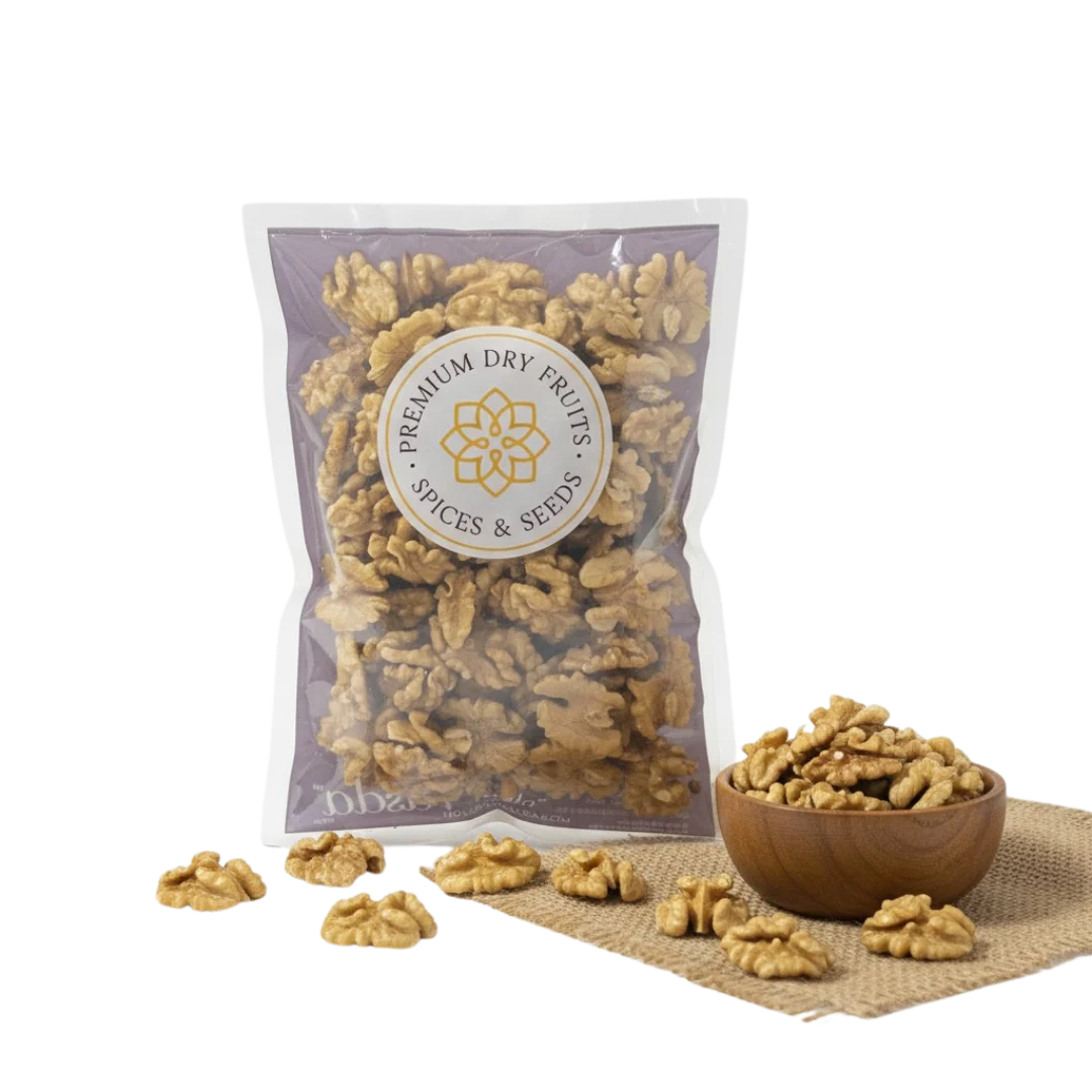 Packaged Chilean walnuts with a bowl of walnuts on a white background