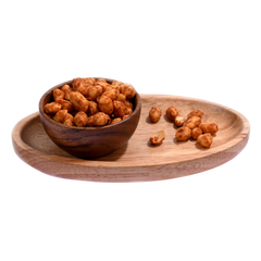 A handful of spicy chilli garlic peanuts with visible garlic bits, emphasizing their irresistible savory aroma.