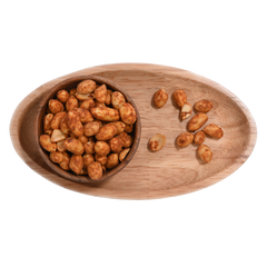 A bowl of chilli garlic peanuts on an elegant table setting, suggesting a perfect snack for social gatherings.