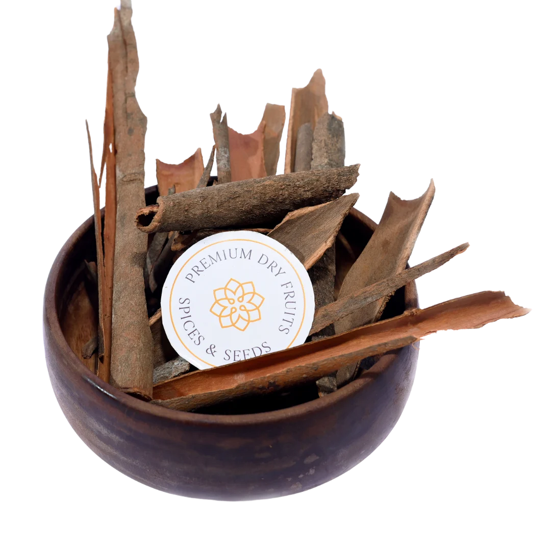 Cinnamon cassia or dal chini sticks in wooden bowl aromatic Indian spice