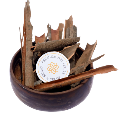 Cinnamon cassia or dal chini sticks in wooden bowl aromatic Indian spice