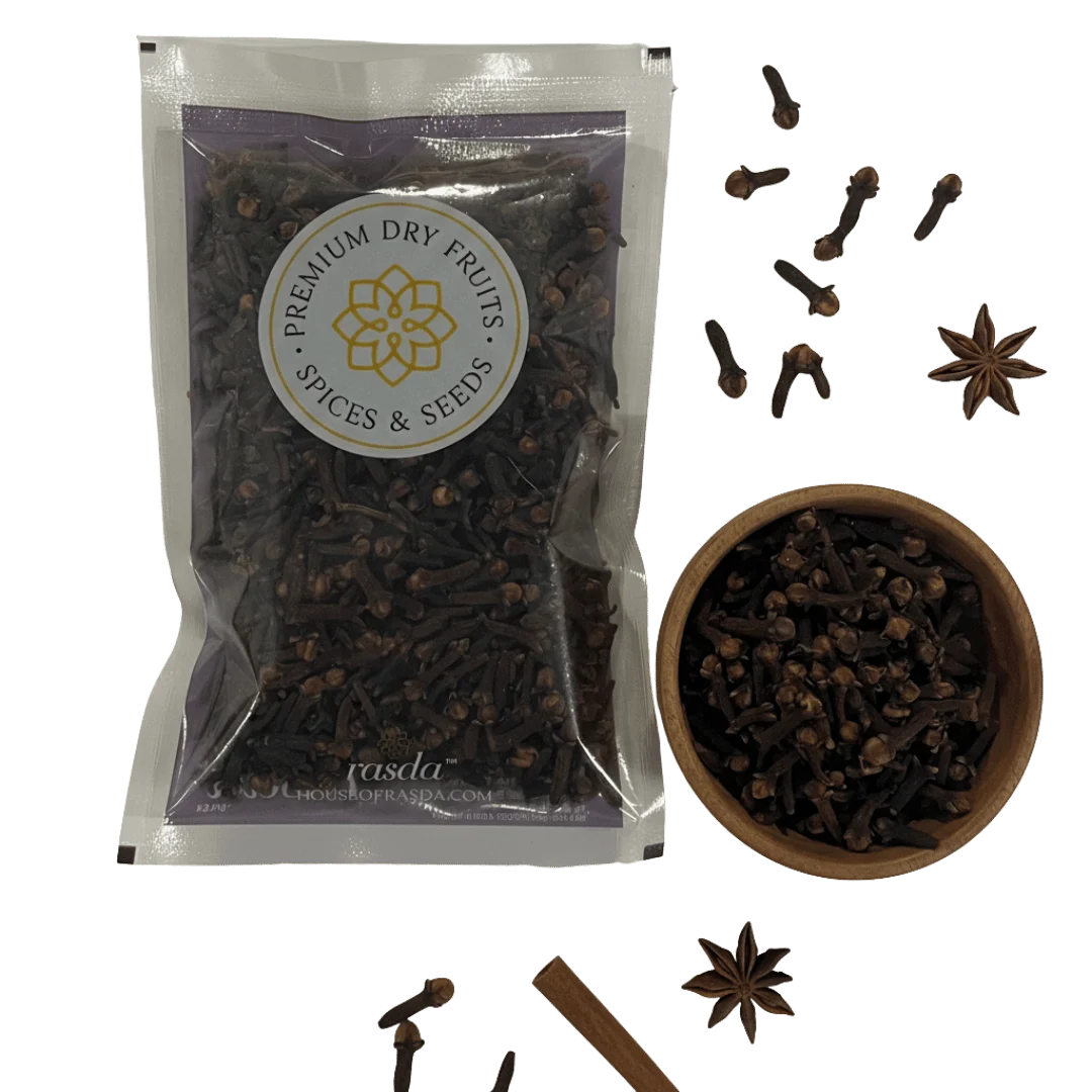 Premium whole cloves by Rasda with cloves in wooden bowl and spice elements on transparent background