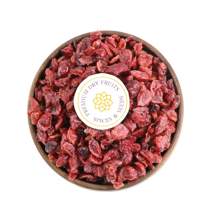 Close-up of Cranberries Dried Sliced Bright Red Soft & Moist, glistening with freshness and vibrant red color.