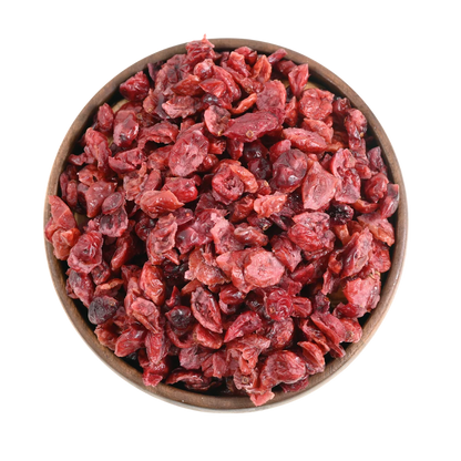 Cranberries Dried Sliced Bright Red Soft & Moist in a wooden bowl on a white background