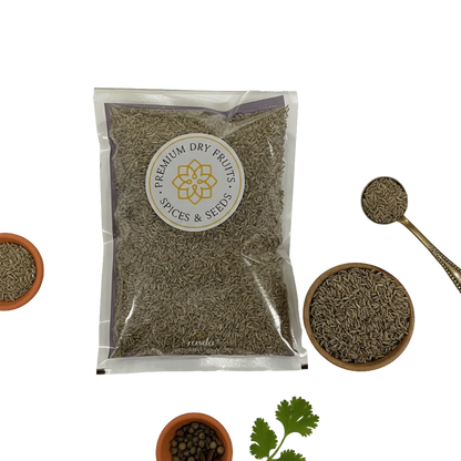 Packaged Cumin Seeds with a spoon and bowls on a white background