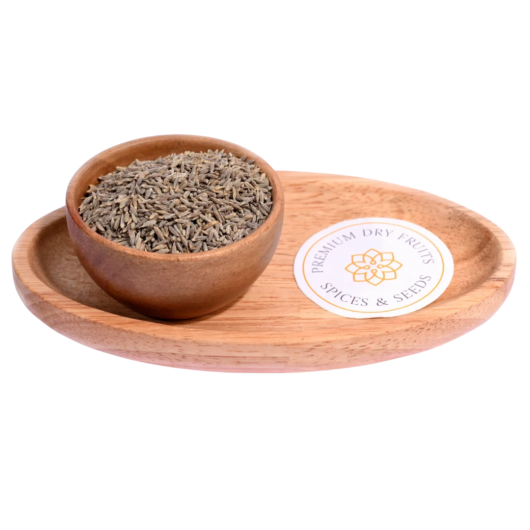 Cumin Seeds / Jeera in a wooden bowl showcase fresh, aromatic seeds for cooking.