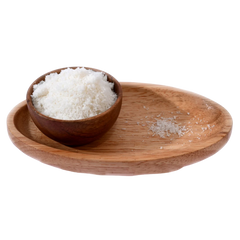 Premium quality Desiccated Coconut Powder Nariyal Burada displayed in a rustic wooden bowl, perfect for desserts and baking.