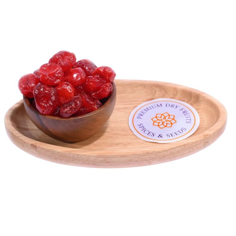 Rich red Dried Cherries Dehydrated displayed in a rustic wooden bowl, showing their glossy texture and natural sweetness.