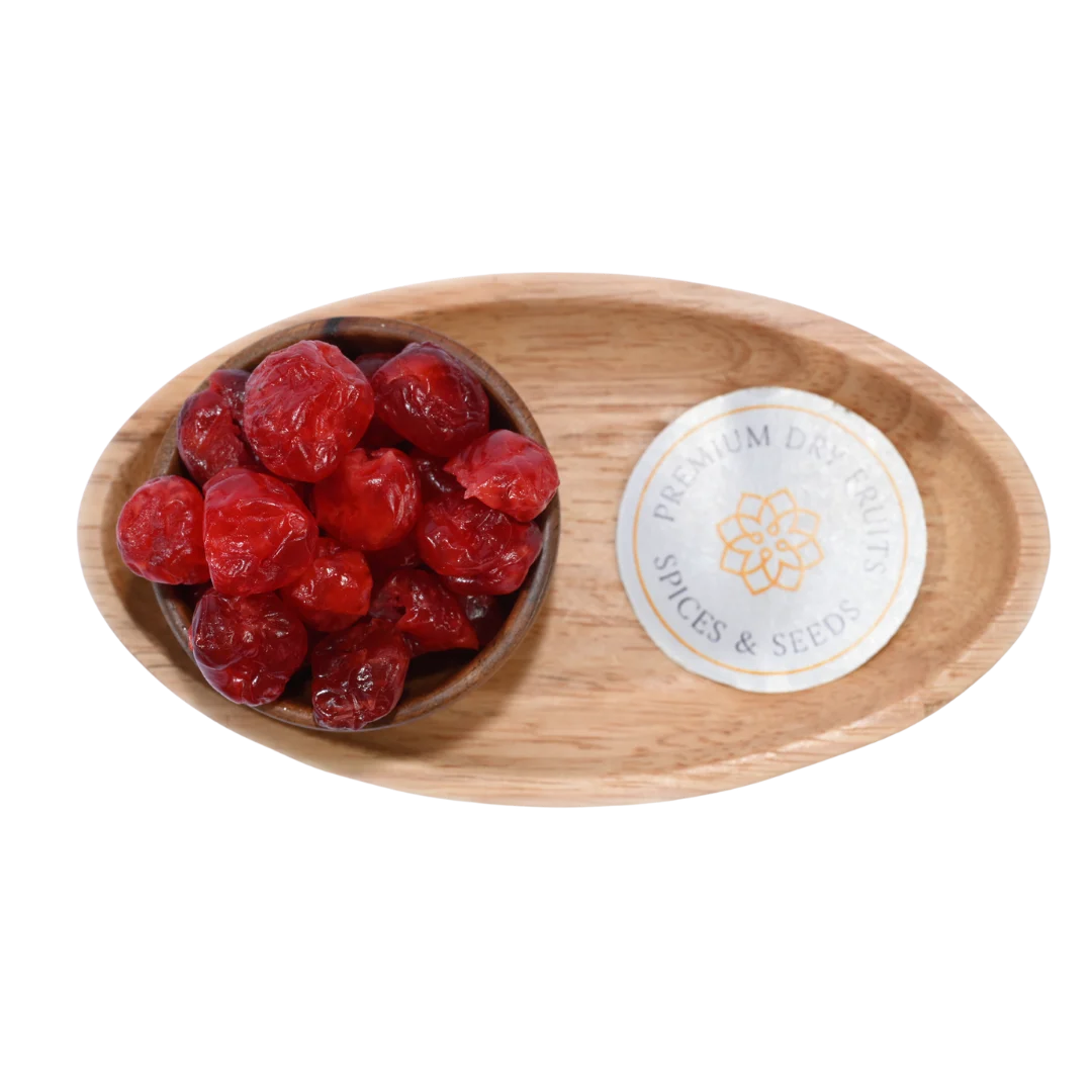 Close-up of Dried Cherries Dehydrated in a wooden bowl, highlighting their soft, chewy, and vibrant red appearance.