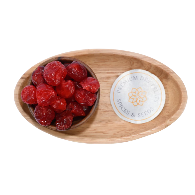 Close-up of Dried Cherries Dehydrated in a wooden bowl, highlighting their soft, chewy, and vibrant red appearance.