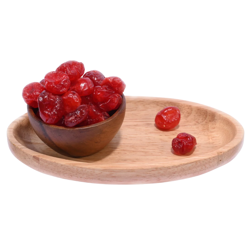 Freshly Dried Cherries Dehydrated arranged in a wooden bowl, perfect for healthy snacking or baking.
