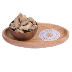 Dried Ginger / Sonth in a wooden bowl showcases premium-quality dried ginger slices.